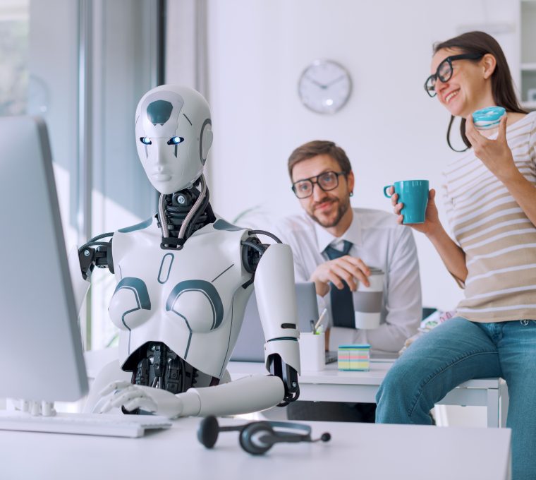 As image of an efficient AI robot working in the office and lazy employees having a coffee break